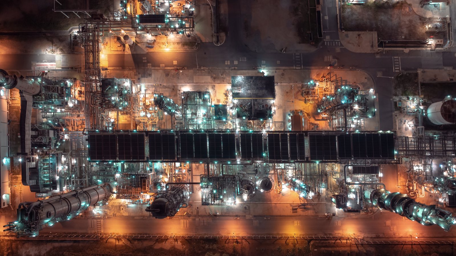 Aerial night view of an oil refinery lit up