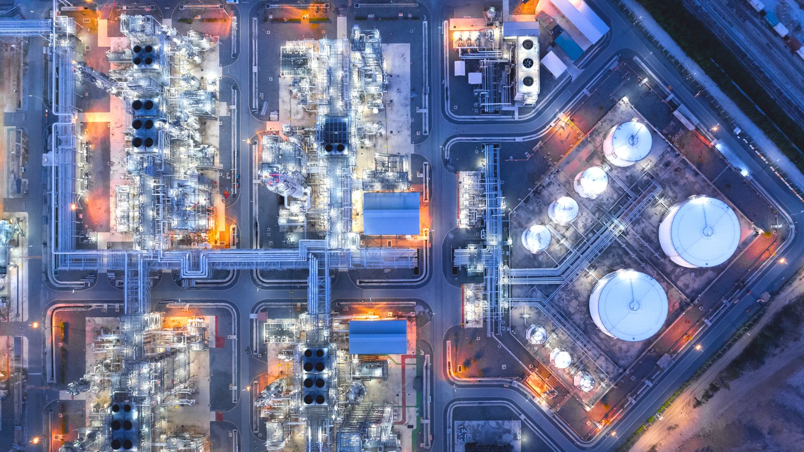 Aerial night view of a petroleum tank farm and processing plant